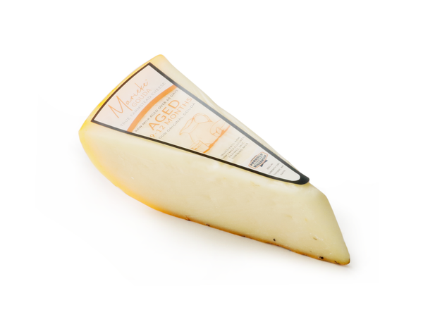 https://www.wisconsincheesemart.com/cdn/shop/files/Aged-Gouda_grande.png?v=1699559472